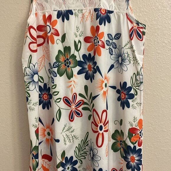 🌸🌺🌸A white dress with colorful floral design the top and back lace design!! - Picture 5 of 6